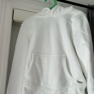 White Artzia Cozy Fleece hoodie. Never been worn. Size small.
